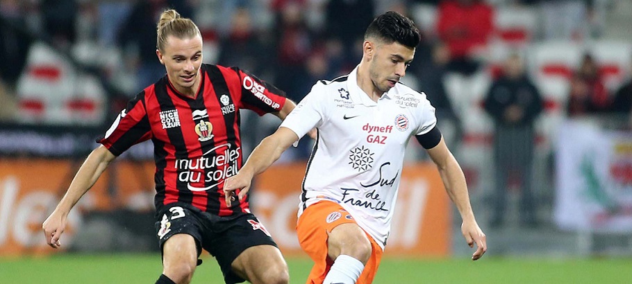 Niklas Hult / Morgan Sanson - 18.12.2015 - Nice / Montpellier - 19eme journee de Ligue 1 Photo : Serge Haouzi / Icon Sport