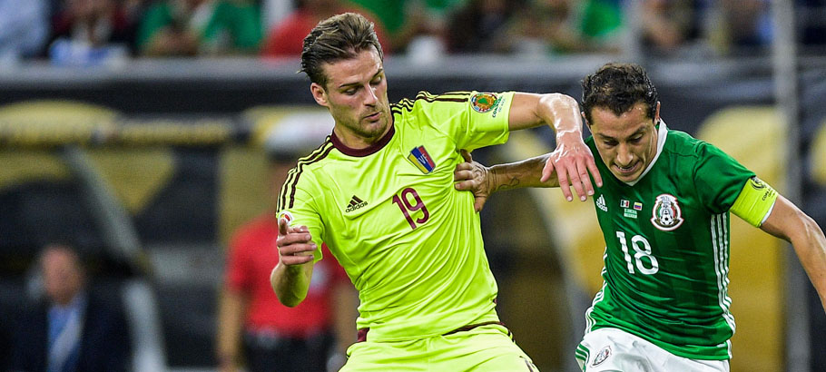 Venezuela's Christian Santos (l) battles for the ball with Mexico's Andres Guardado (r). -------------------- Football - Copa America 2016 Group Stage Group C Mexico v Venezuela NRG Stadium, Houston, United States 13 June 2016 Photo : BPI / Icon Sport