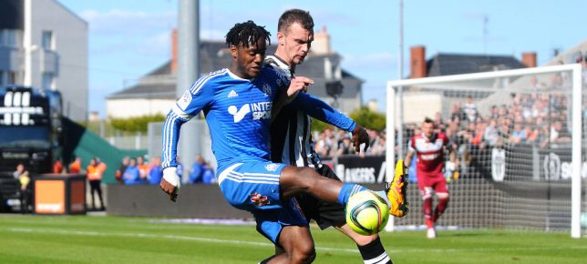 Michy Batshuayi and Romain Thomas during the French Ligue 1 match between Angers SCO and Olympique de Marseille on May 1, 2016 in Angers, France. (Photo by Philippe Le Brech/Icon Sport)