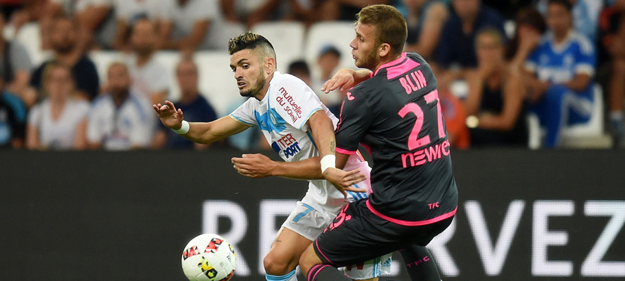 Remy Cabella of Marseille and Alexis Blin of Toulouse during the football Ligue 1 match between Olympique de Marseille and Toulouse Fc at Stade Velodrome on August 14, 2016 in Marseille, France. (Photo by Alexandre Dimou/Icon Sport)