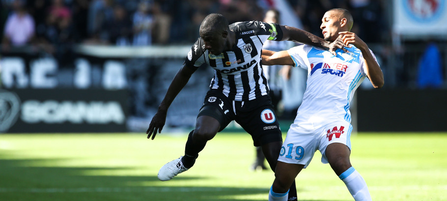 Cheick N'Doye of Angers and William Vainqueur of Marseille during the ligue 1 match between Angers SCO and Olympique de Marseille on October 2, 2016 in Angers, France. (Photo Icon Sport)